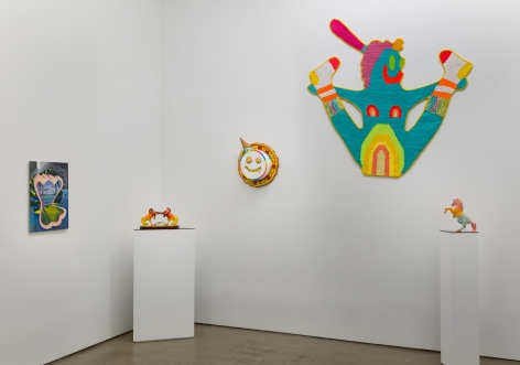 Installation view of ALIVE WITH PLEASURE!, which features a mix of artworks on hung on the walls and sculptures on pedestals