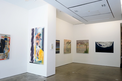 This is an installation view of the group exhibition Counter Narratives: Geographies of the Unfamiliar, which features paintings on the walls.